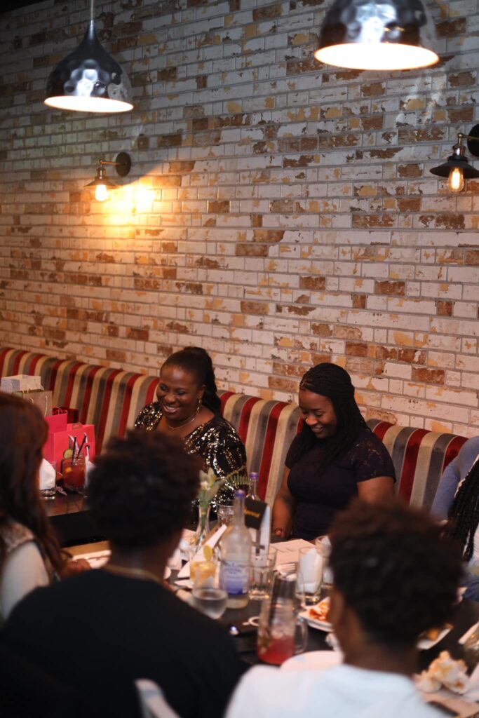 A group of people having a nice birthday dinner at demis restaurant